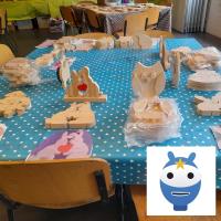 Houten figuren versieren